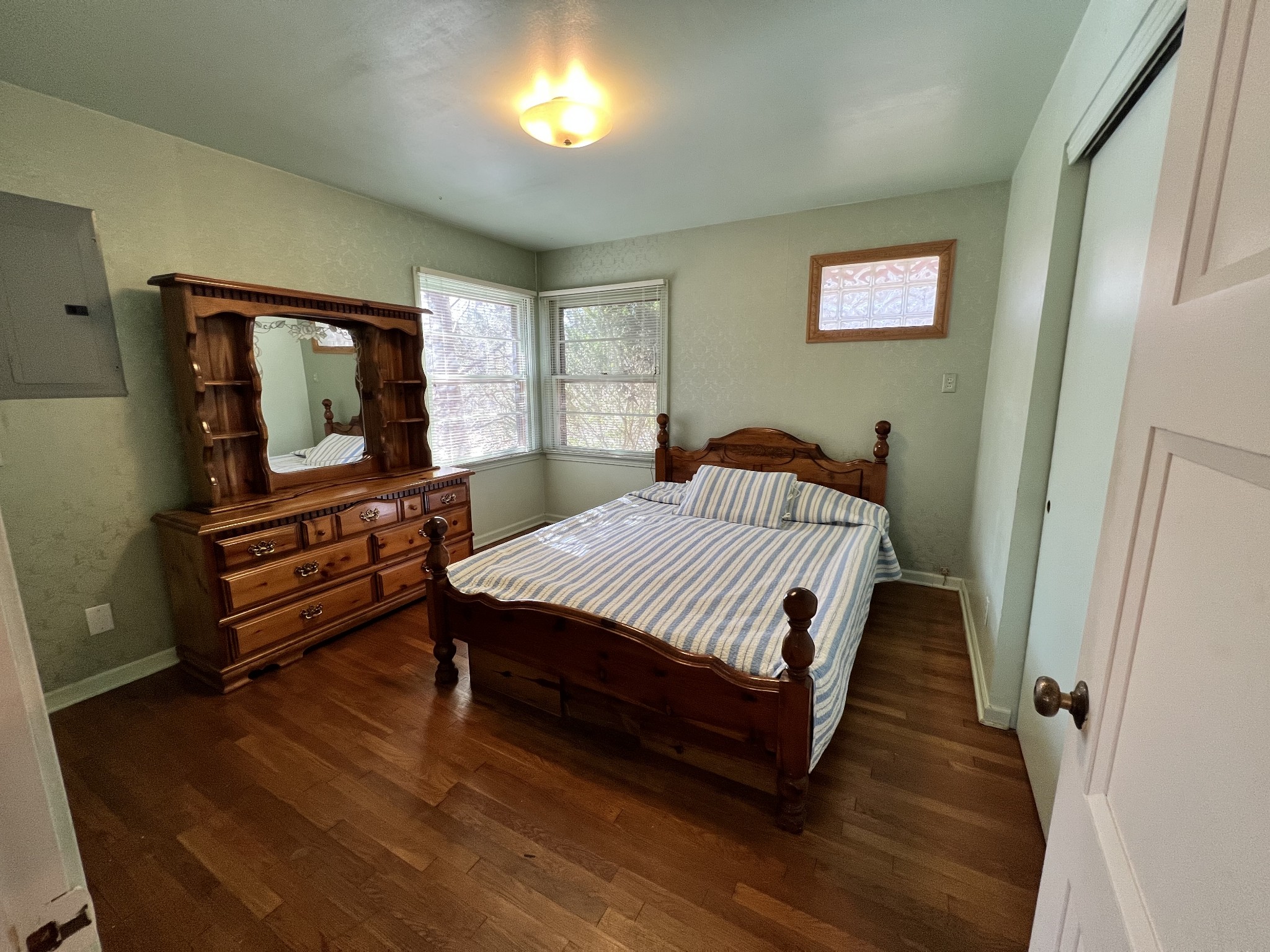 499 Willow Oak Road Manchester, TN 37355 - Photo 16 of 26 a bed sitting in a bedroom next to a window