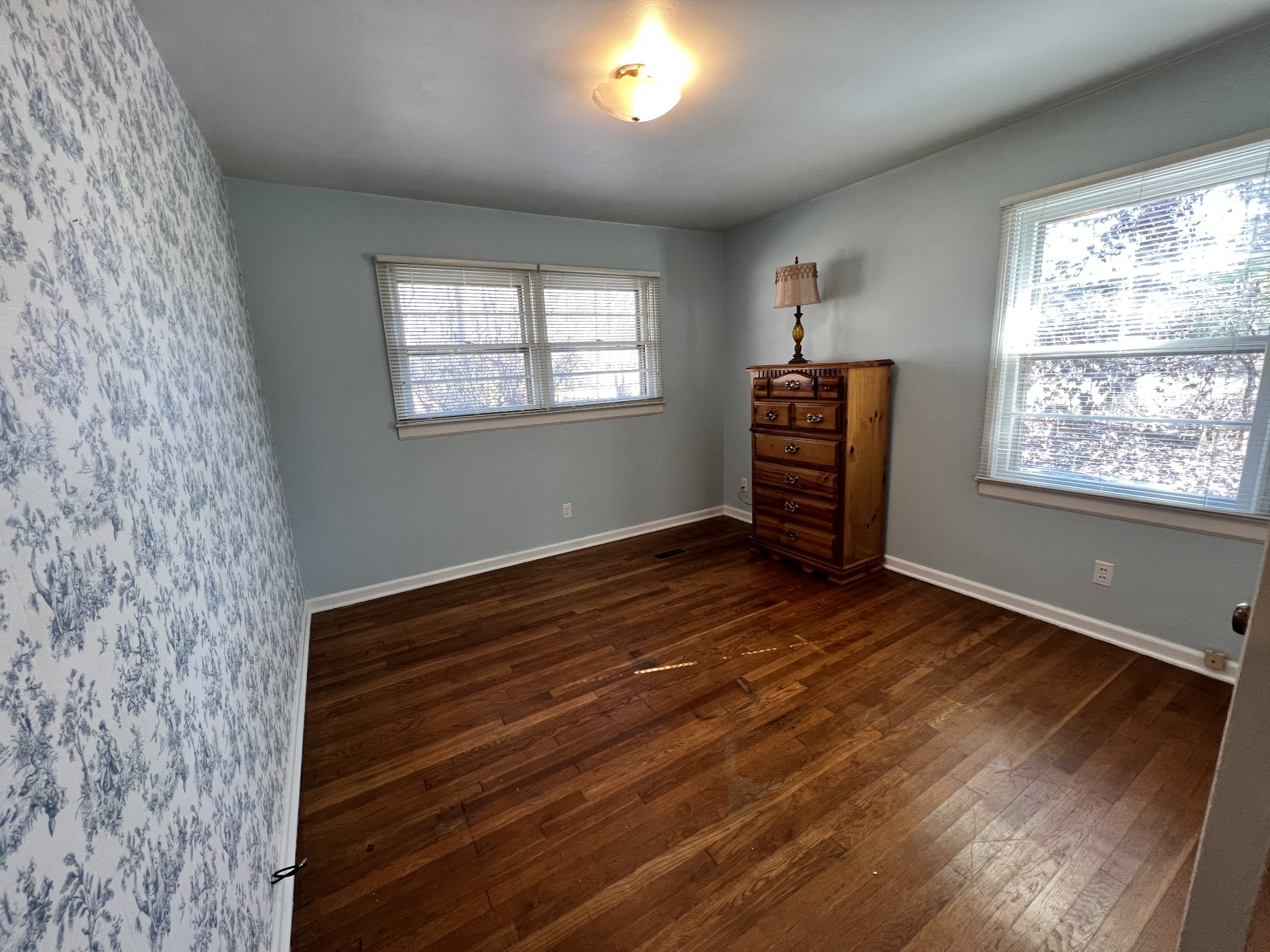 499 Willow Oak Road Manchester, TN 37355 - Photo 17 of 26 a view of empty room with wooden floor and fan