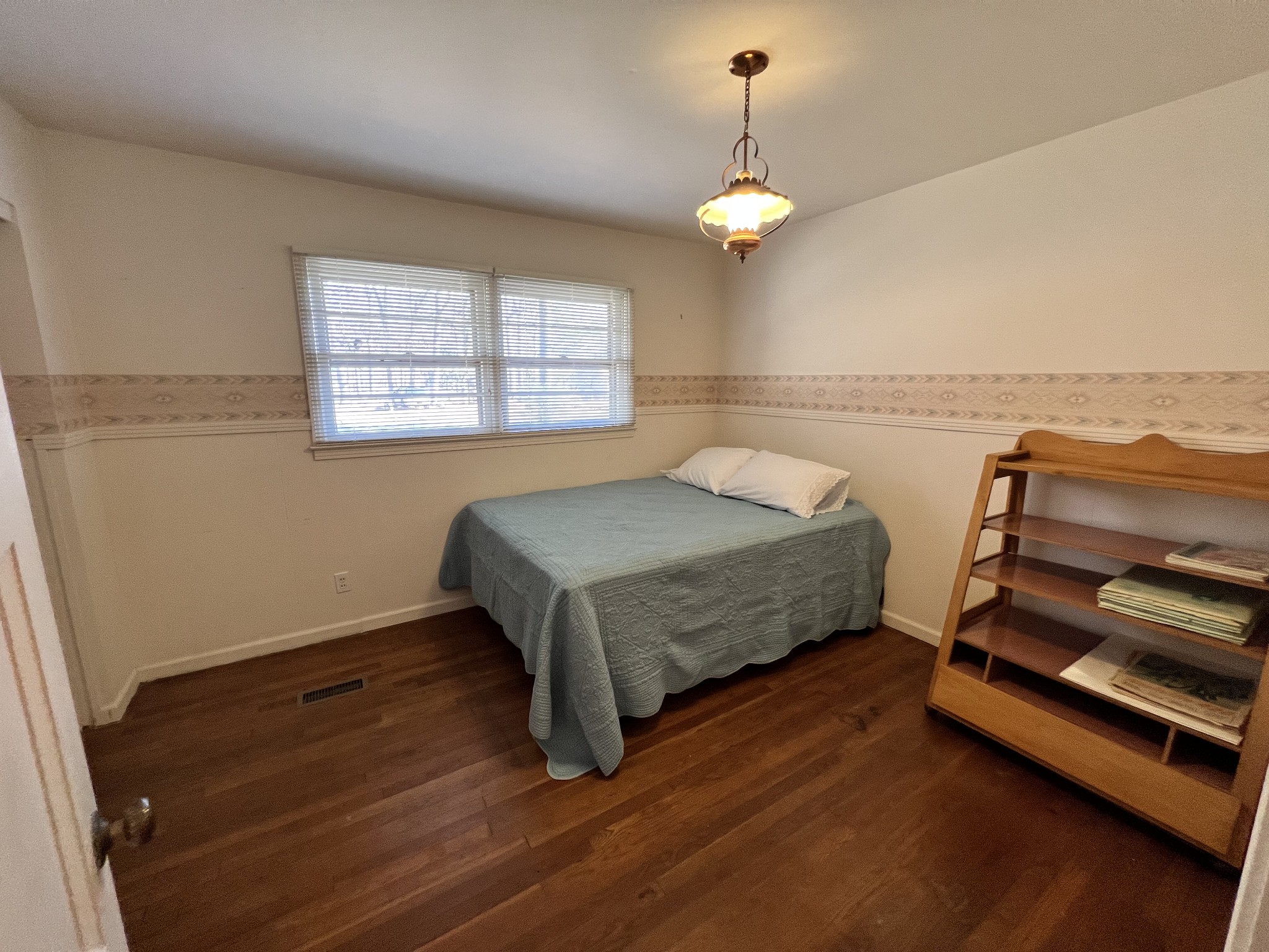 499 Willow Oak Road Manchester, TN 37355 - Photo 19 of 26 a bedroom with furniture and a window