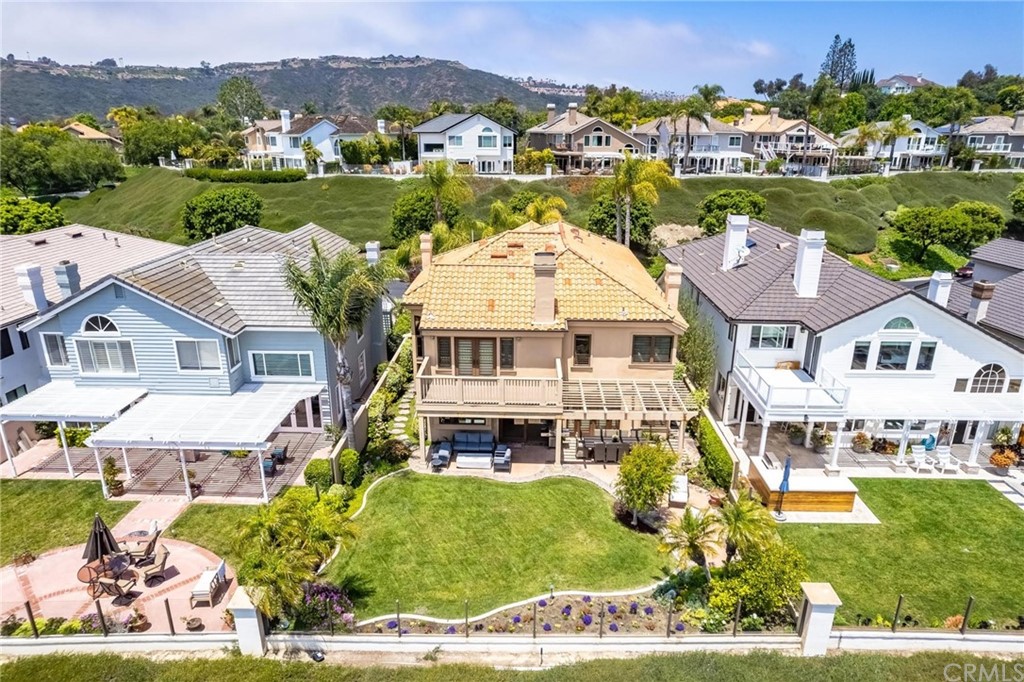 14 Camberley Laguna Niguel, CA 92677 - Photo 12 of 69 an aerial view of a house with a garden potted plants and large trees