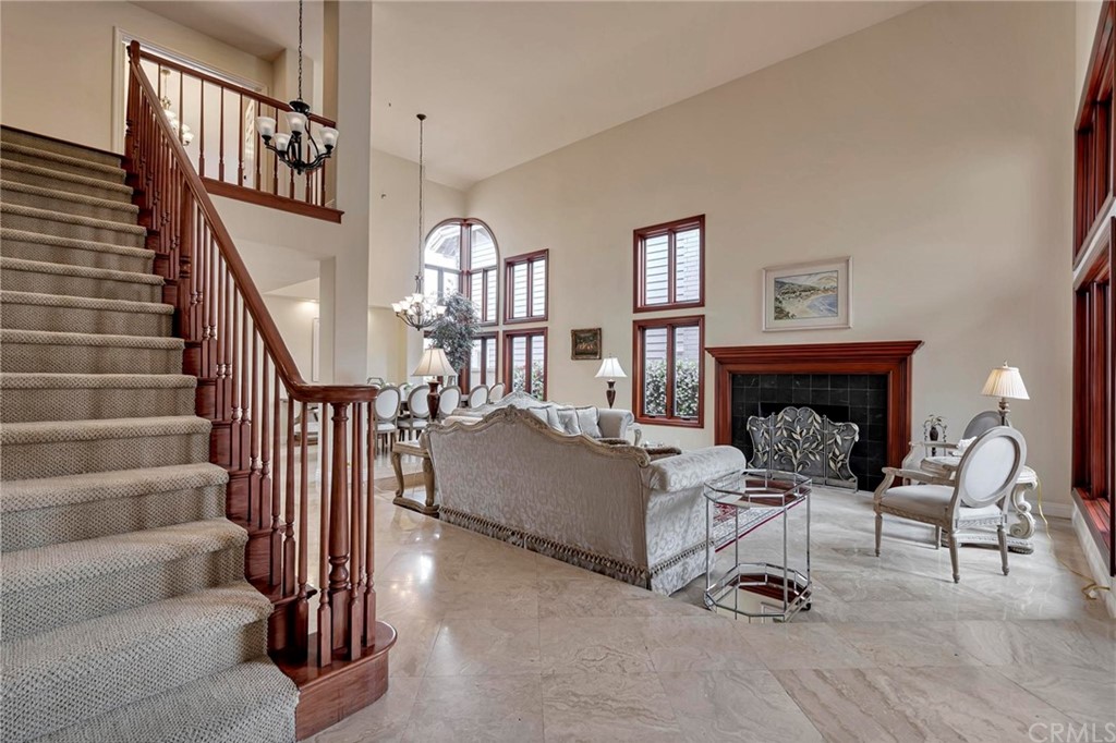 14 Camberley Laguna Niguel, CA 92677 - Photo 19 of 69 a living room with furniture and a fireplace