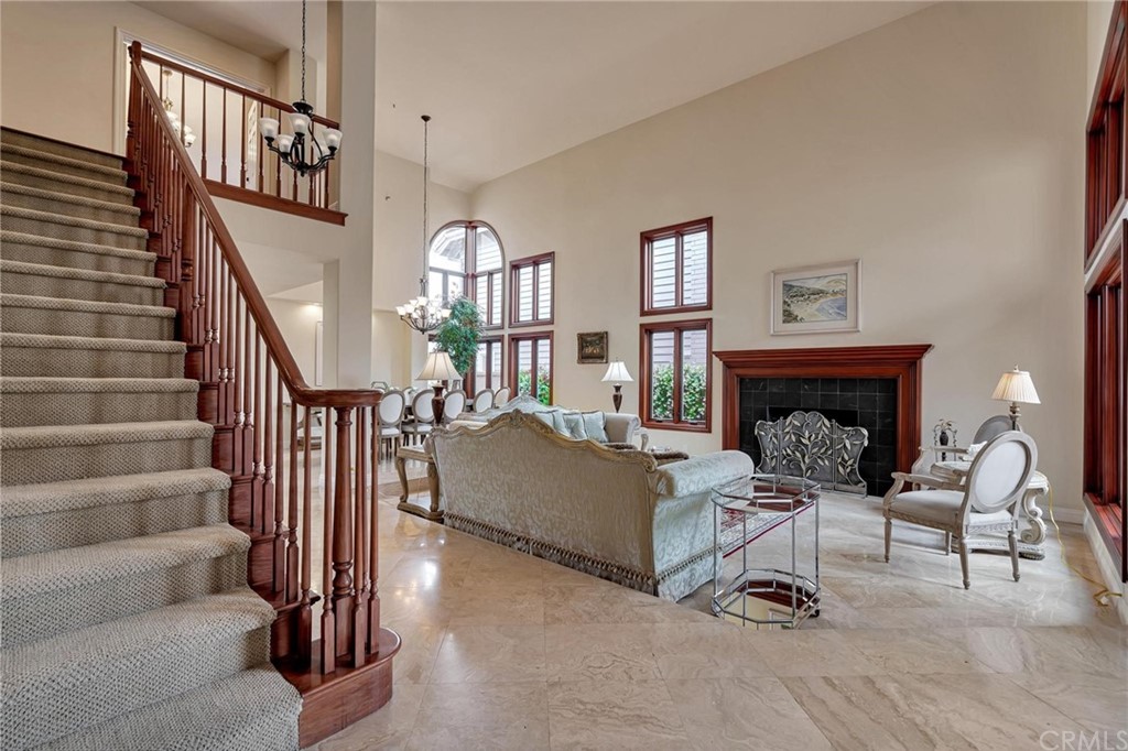 14 Camberley Laguna Niguel, CA 92677 - Photo 26 of 69 a living room with furniture and a fireplace