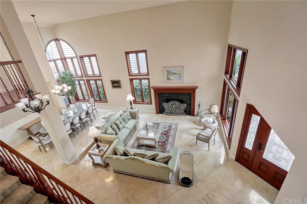 14 Camberley Laguna Niguel, CA 92677 - Photo 30 of 69 a living room with furniture and a fireplace