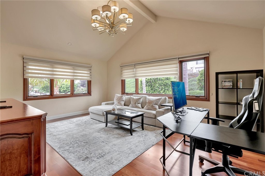 14 Camberley Laguna Niguel, CA 92677 - Photo 31 of 69 a living room with furniture a window and a table