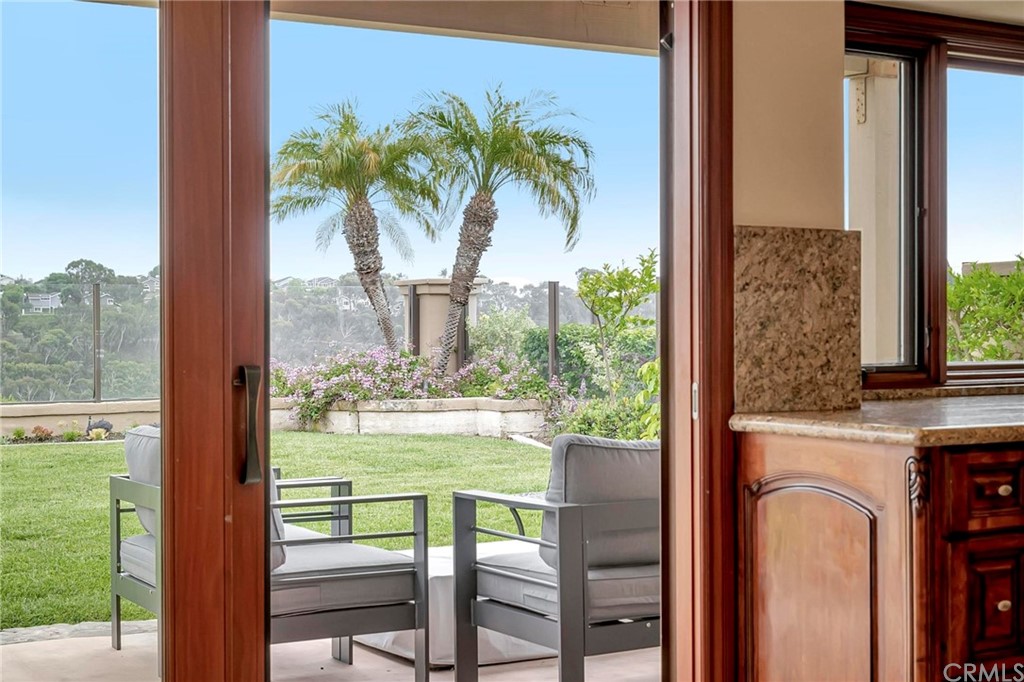 14 Camberley Laguna Niguel, CA 92677 - Photo 37 of 69 a view of a room with a large window and chair