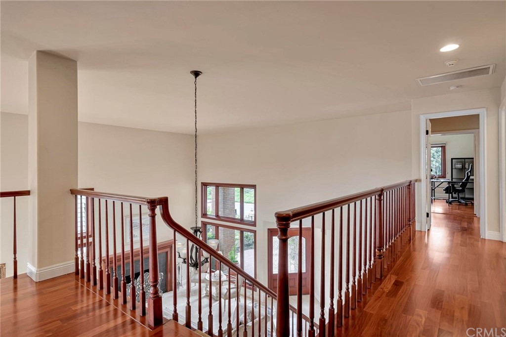 14 Camberley Laguna Niguel, CA 92677 - Photo 45 of 69 a view of hallway with wooden floor
