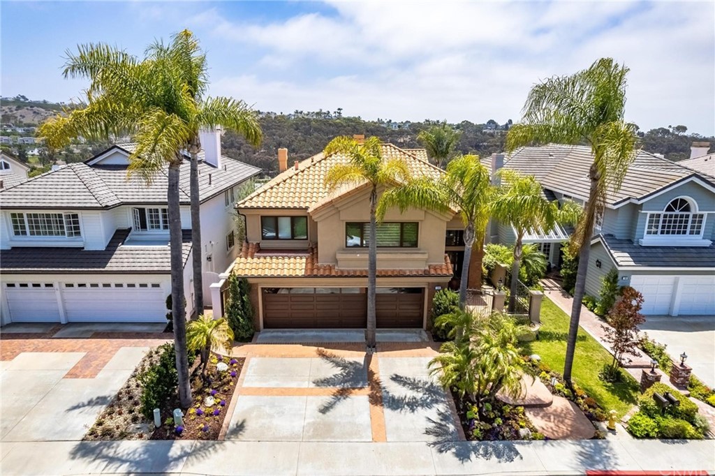 14 Camberley Laguna Niguel, CA 92677 - Photo 5 of 69 a front view of a house with a garden