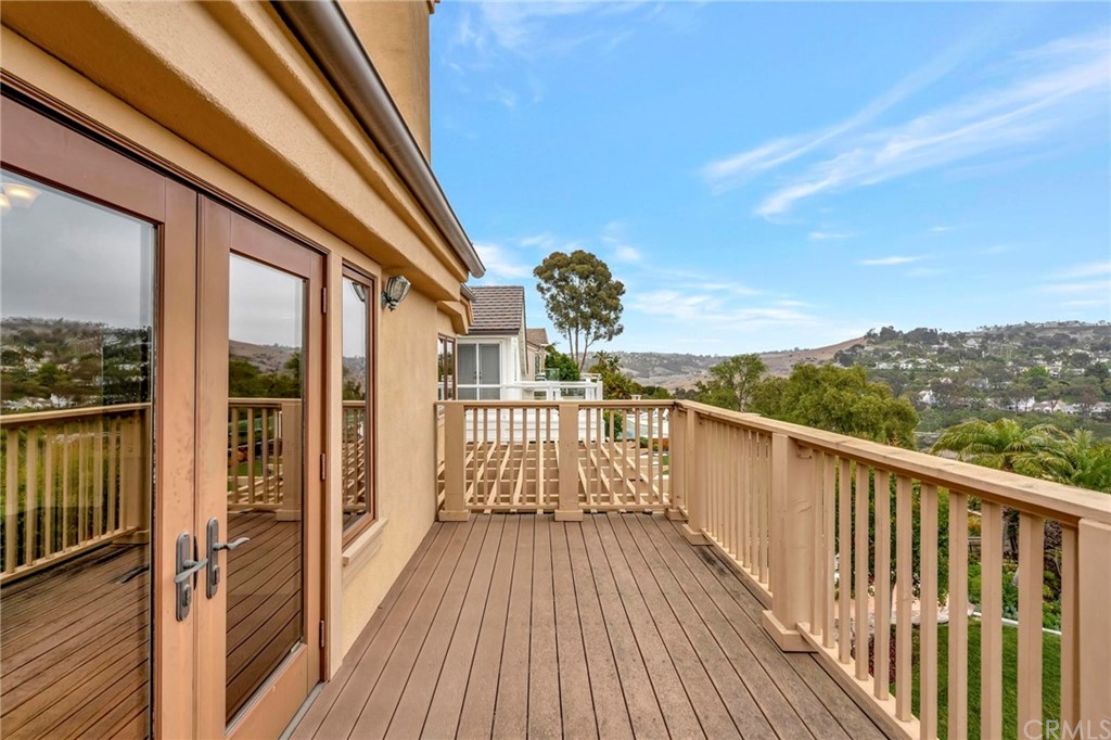 14 Camberley Laguna Niguel, CA 92677 - Photo 57 of 69 a view of a balcony with wooden floor