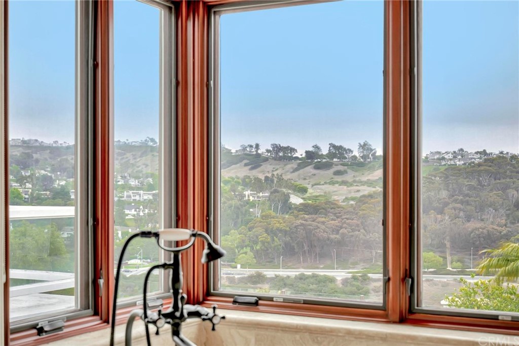 14 Camberley Laguna Niguel, CA 92677 - Photo 62 of 69 a view of a room with a large window and chair