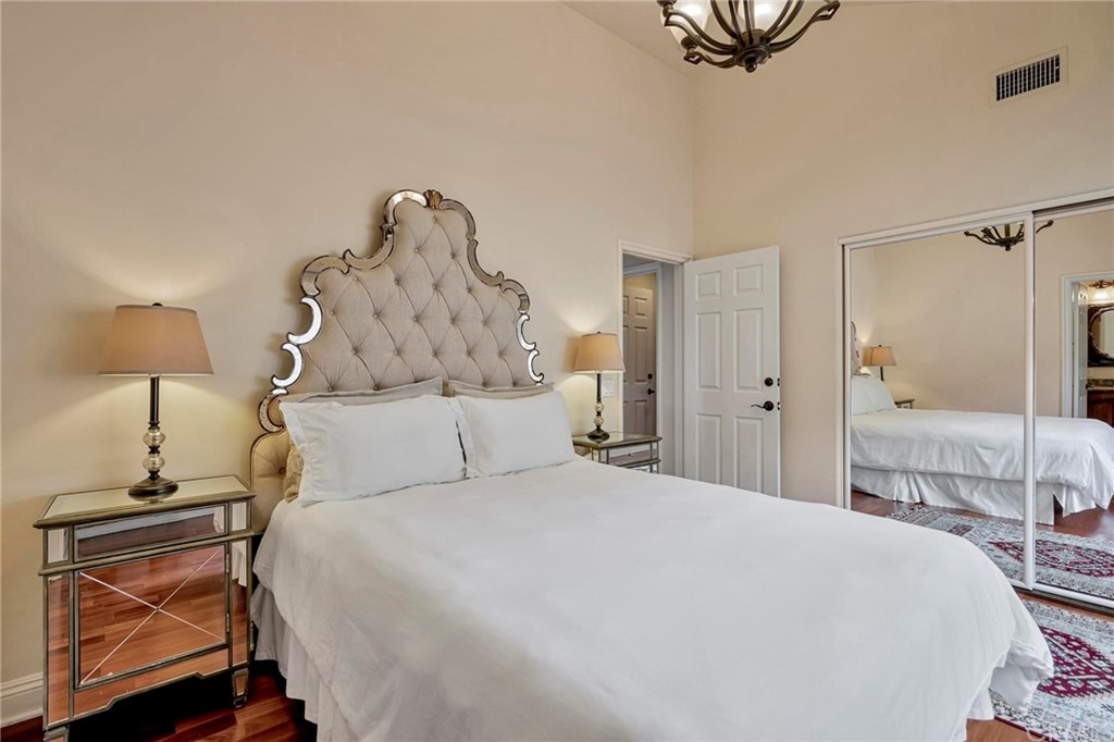 14 Camberley Laguna Niguel, CA 92677 - Photo 64 of 69 a bedroom with a bed and a lamp on table