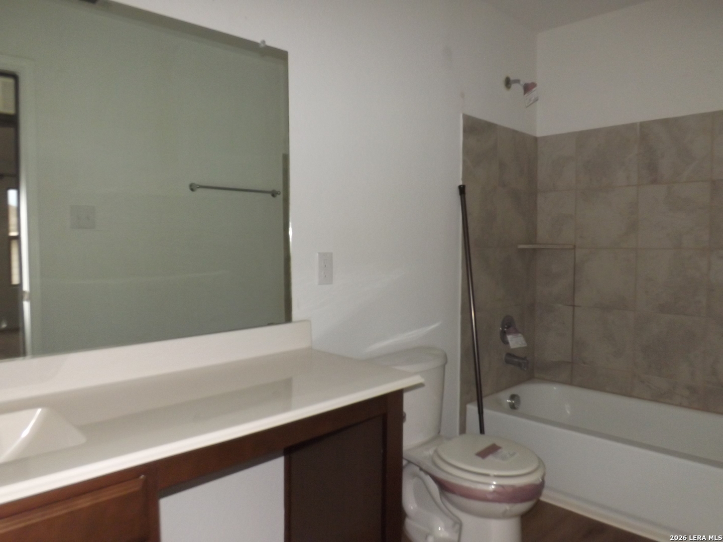 6835 Alaskan Wy. Converse, TX 78109 - Photo 13 of 22 a bathroom with a bathtub and toilet