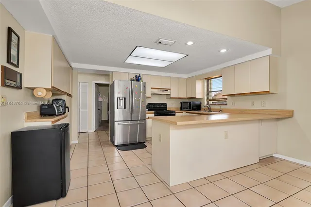 $587,000 | 7921 Northwest 90th Avenue, Tamarac, FL 33321