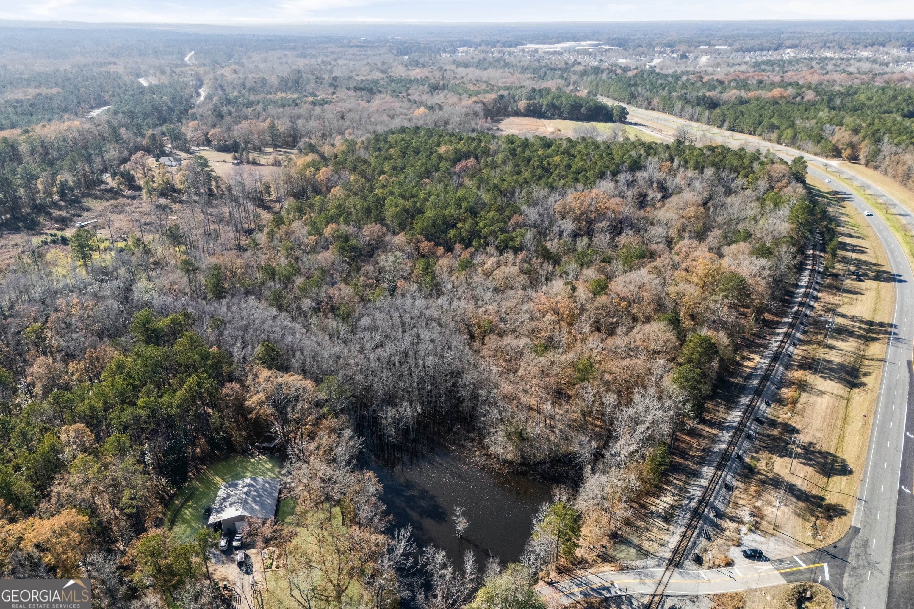 4057 Pope Road Midland, GA 31820 - Photo 13 of 15 an aerial view of house with yard and mountain view in back