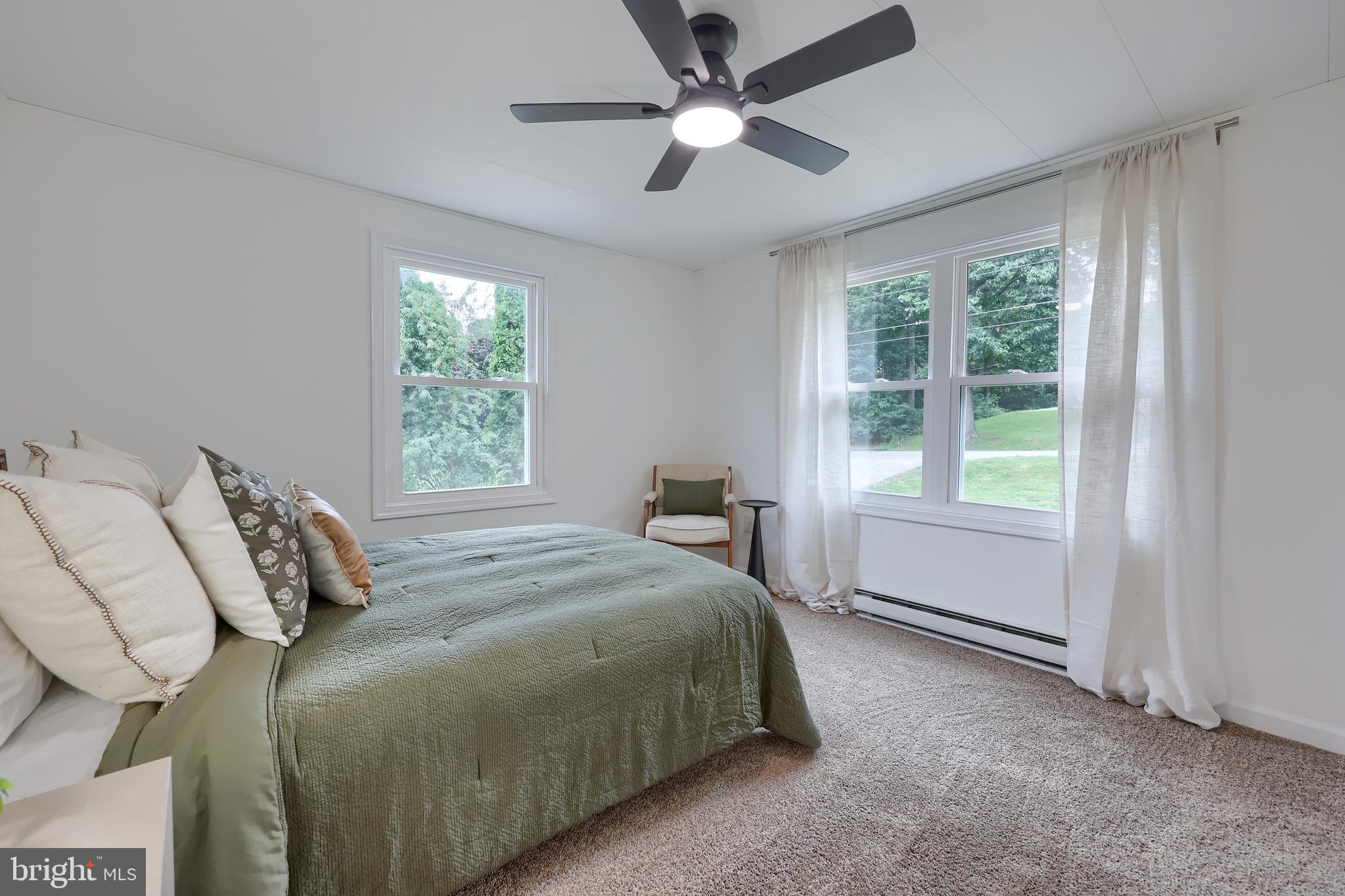 2208 Keeney Road Spring Grove, PA 17362 - Photo 30 of 64 a bedroom with a bed and a large window