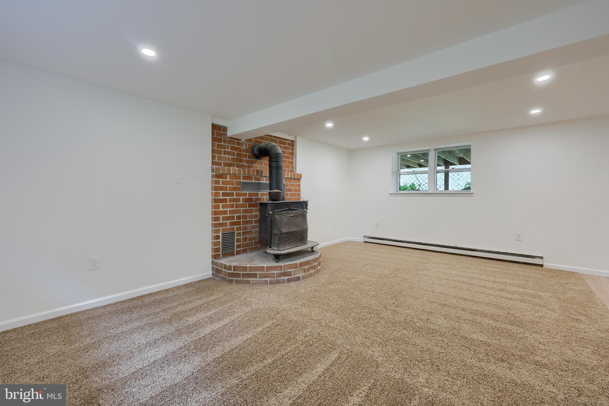 2208 Keeney Road Spring Grove, PA 17362 - Photo 40 of 64 a view of an empty room with a fireplace