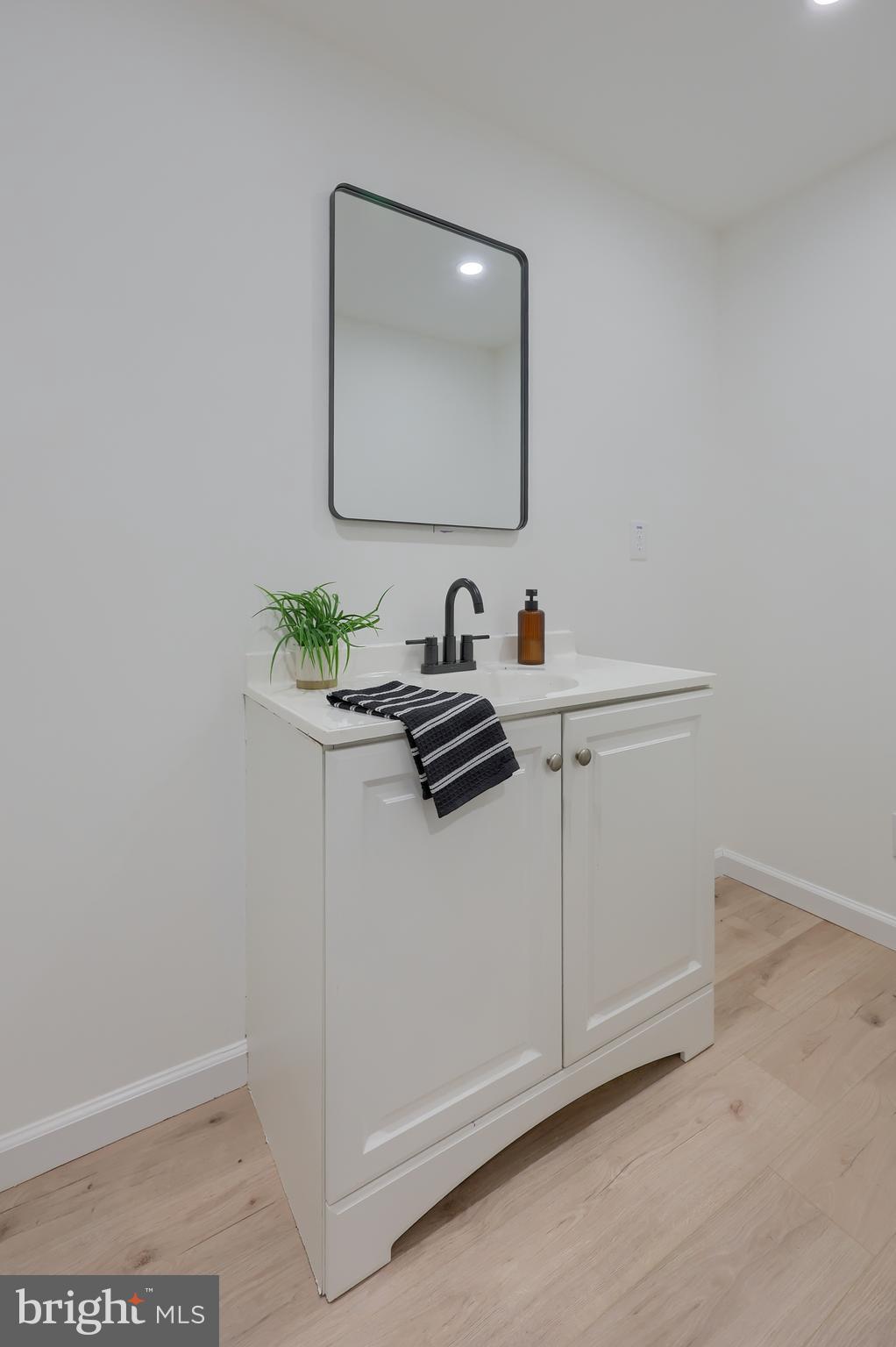 2208 Keeney Road Spring Grove, PA 17362 - Photo 43 of 64 a bathroom with a sink and a mirror