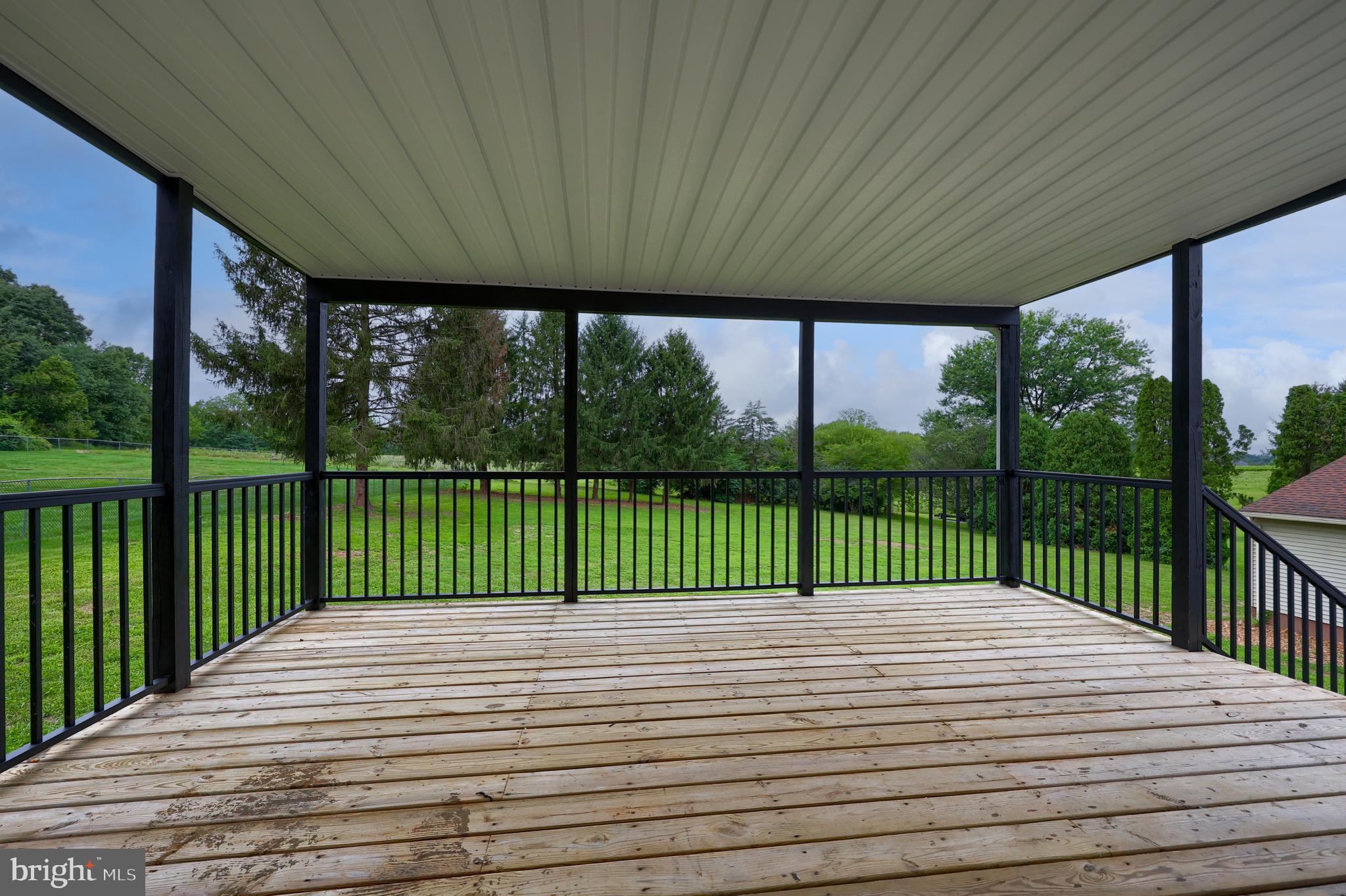 2208 Keeney Road Spring Grove, PA 17362 - Photo 45 of 64 a view of a balcony with a floor to ceiling window