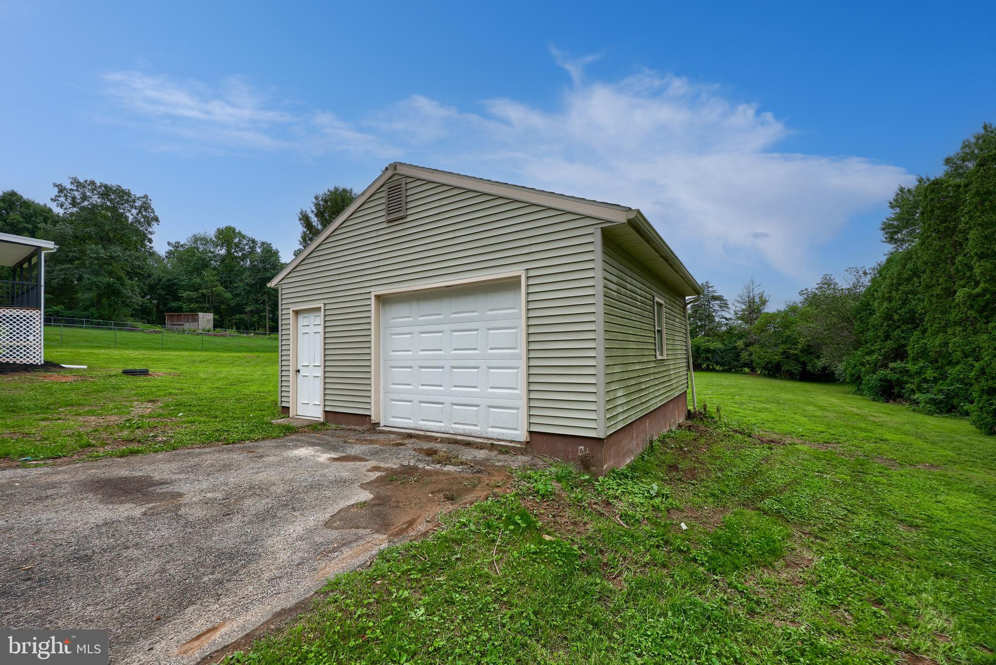 2208 Keeney Road Spring Grove, PA 17362 - Photo 47 of 64 a view of a house with yard and a garden