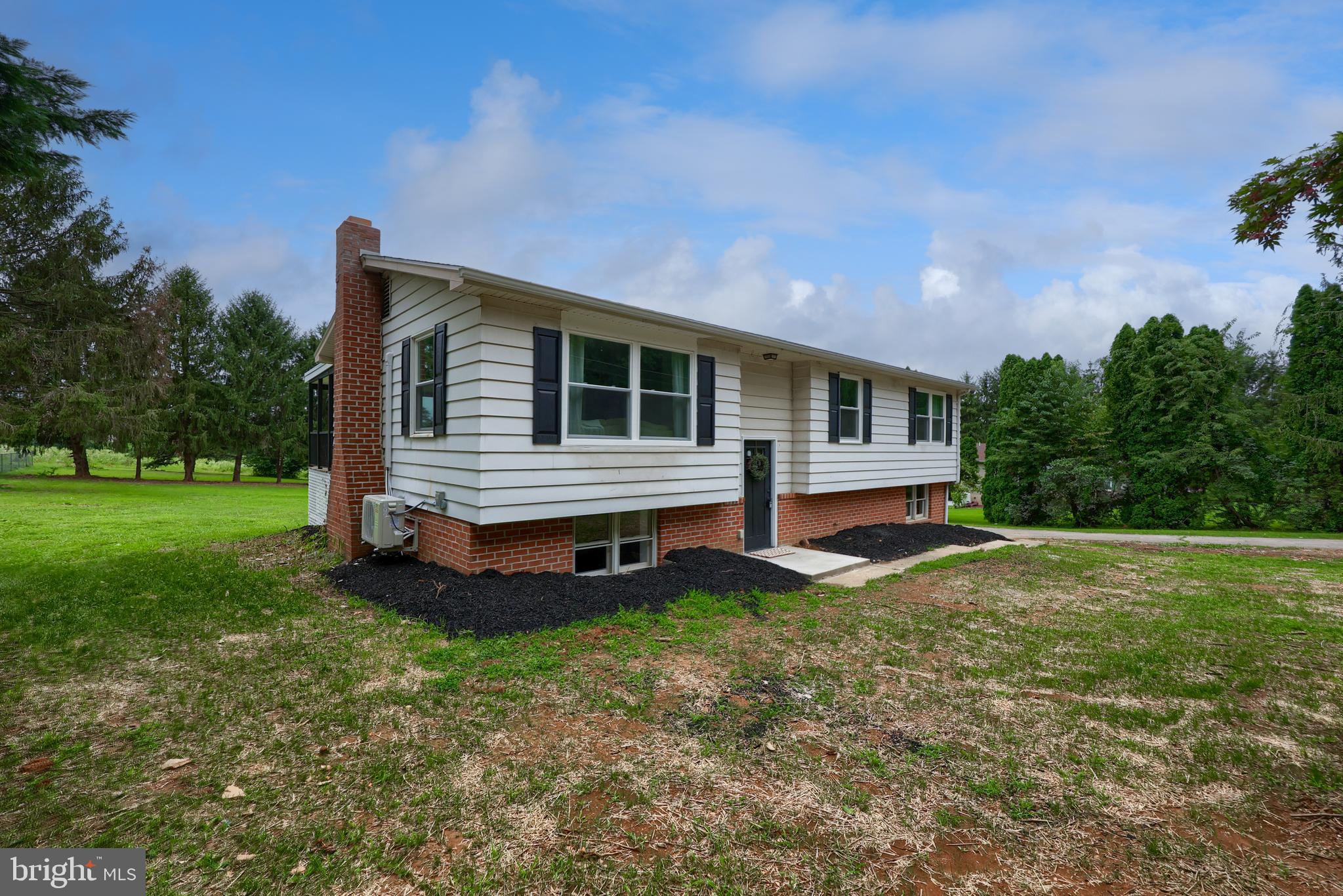 2208 Keeney Road Spring Grove, PA 17362 - Photo 48 of 64 a front view of a house with a yard