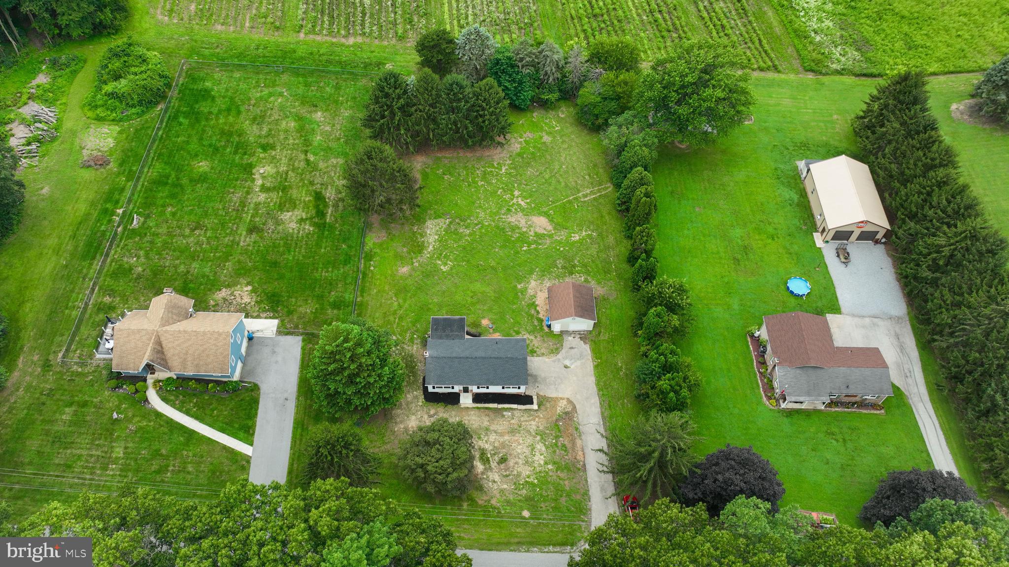 2208 Keeney Road Spring Grove, PA 17362 - Photo 55 of 64 an aerial view of residential house with outdoor space and trees all around