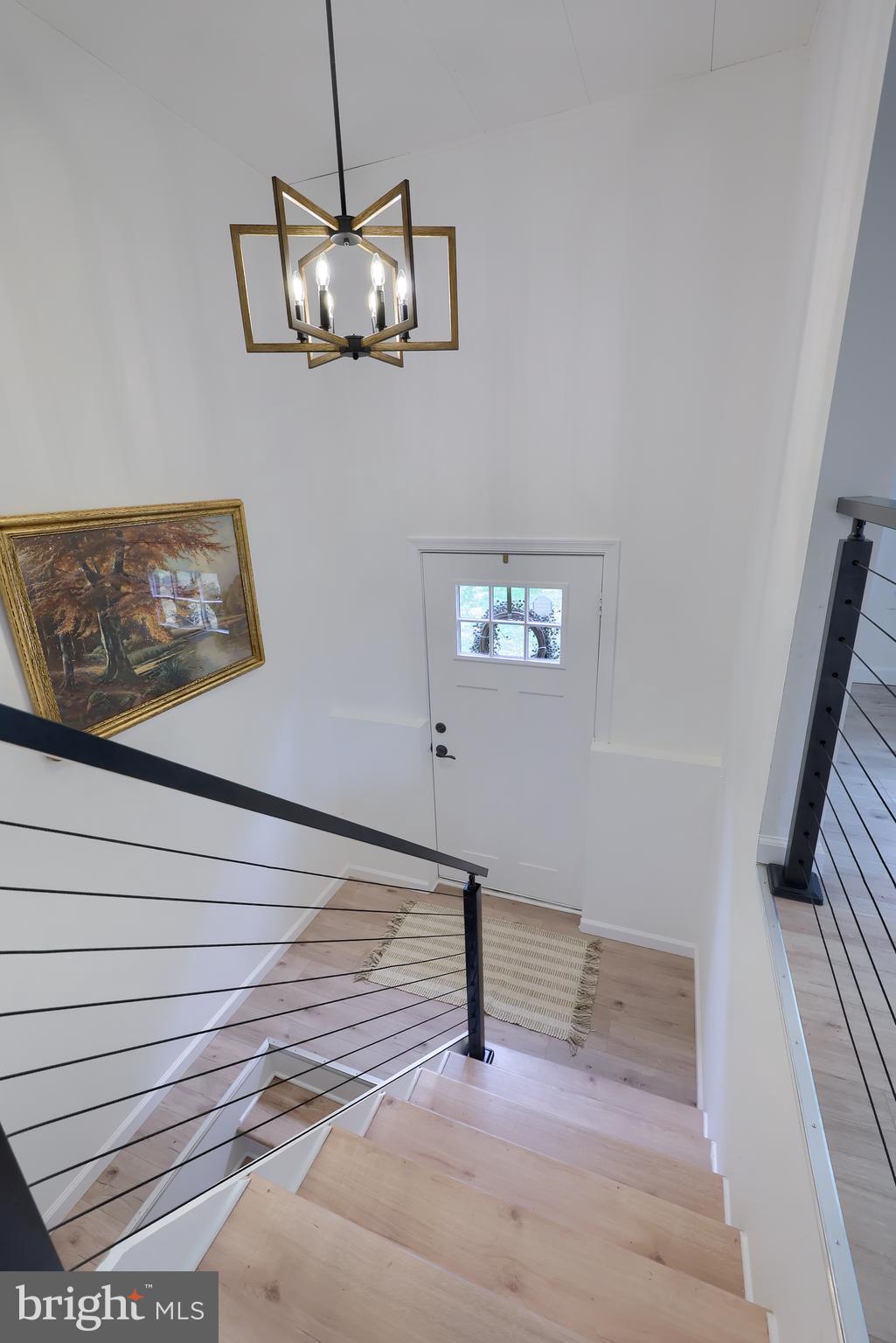 2208 Keeney Road Spring Grove, PA 17362 - Photo 9 of 64 a view of a hallway with wooden floor and staircase