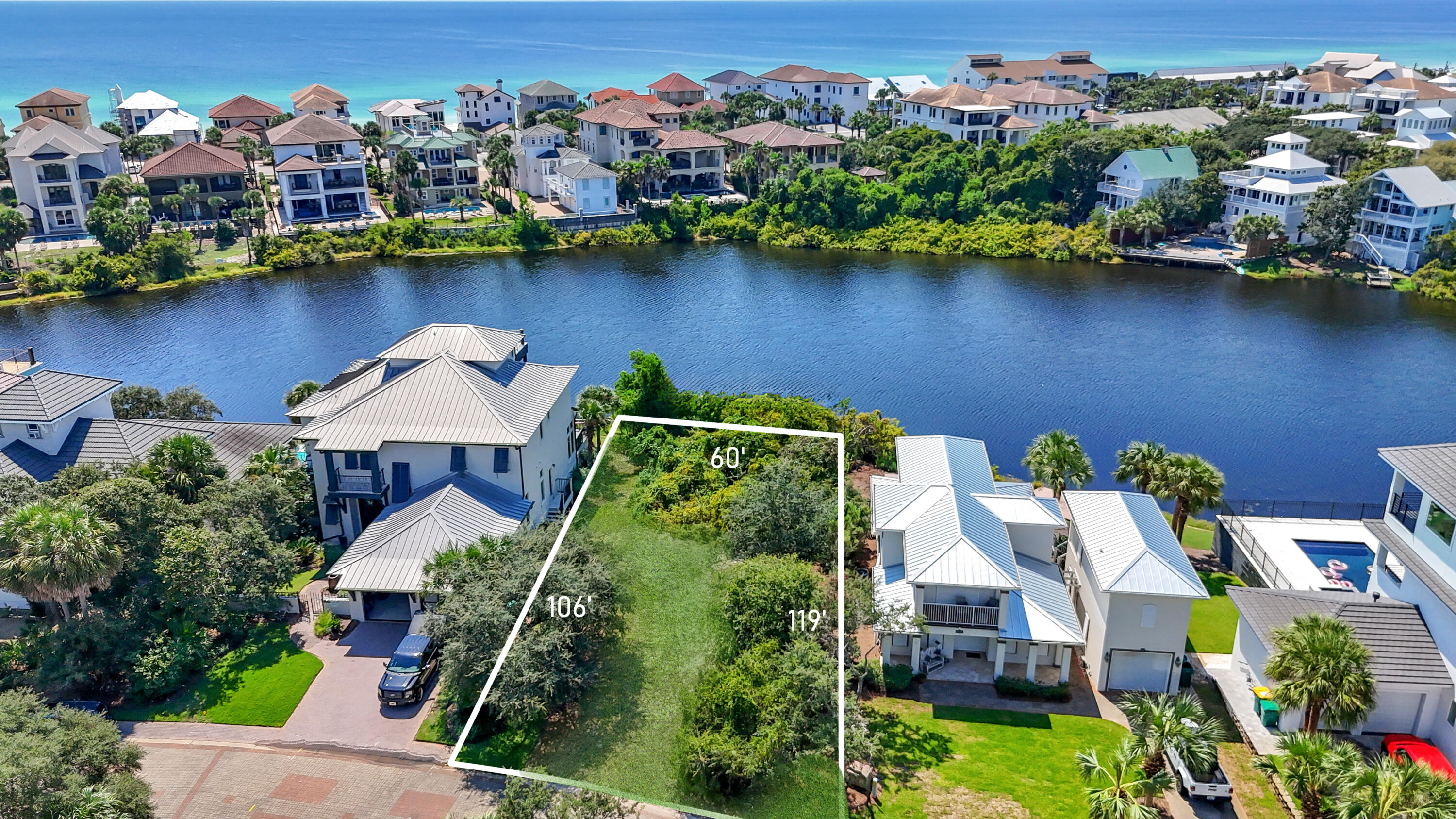 4630 Sunset Pointe Destin, FL 32541 - Photo 1 of 4 an aerial view of a house with a lake view