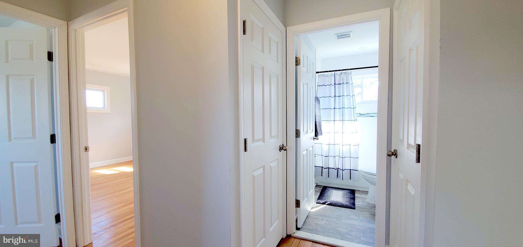 933 Bardswell Road Baltimore, MD 21228 - Photo 13 of 34 Upper Hall to Bath (Linens Left, Attic Right)