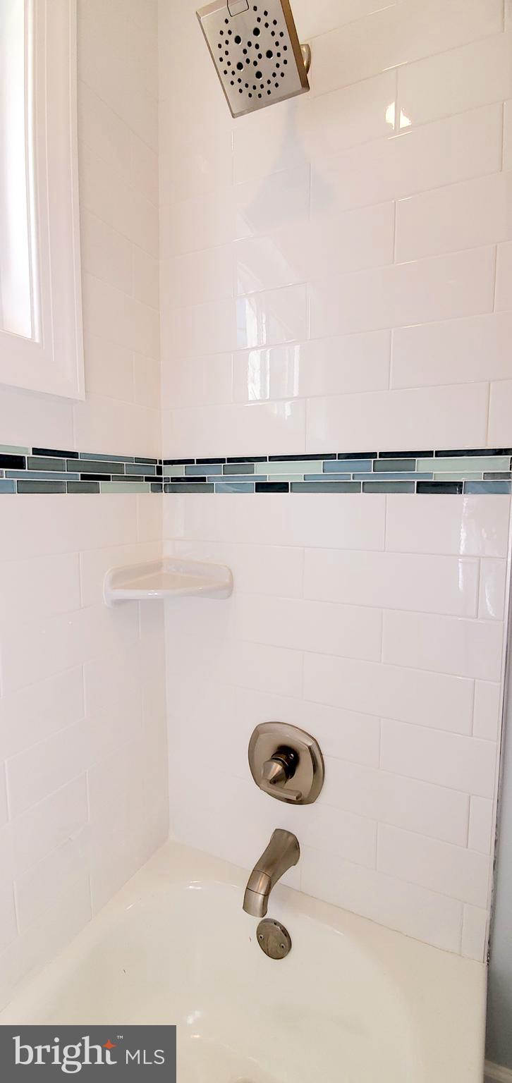 933 Bardswell Road Baltimore, MD 21228 - Photo 15 of 34 Hall Bath Includes Glass Tile and Brushed Nickel