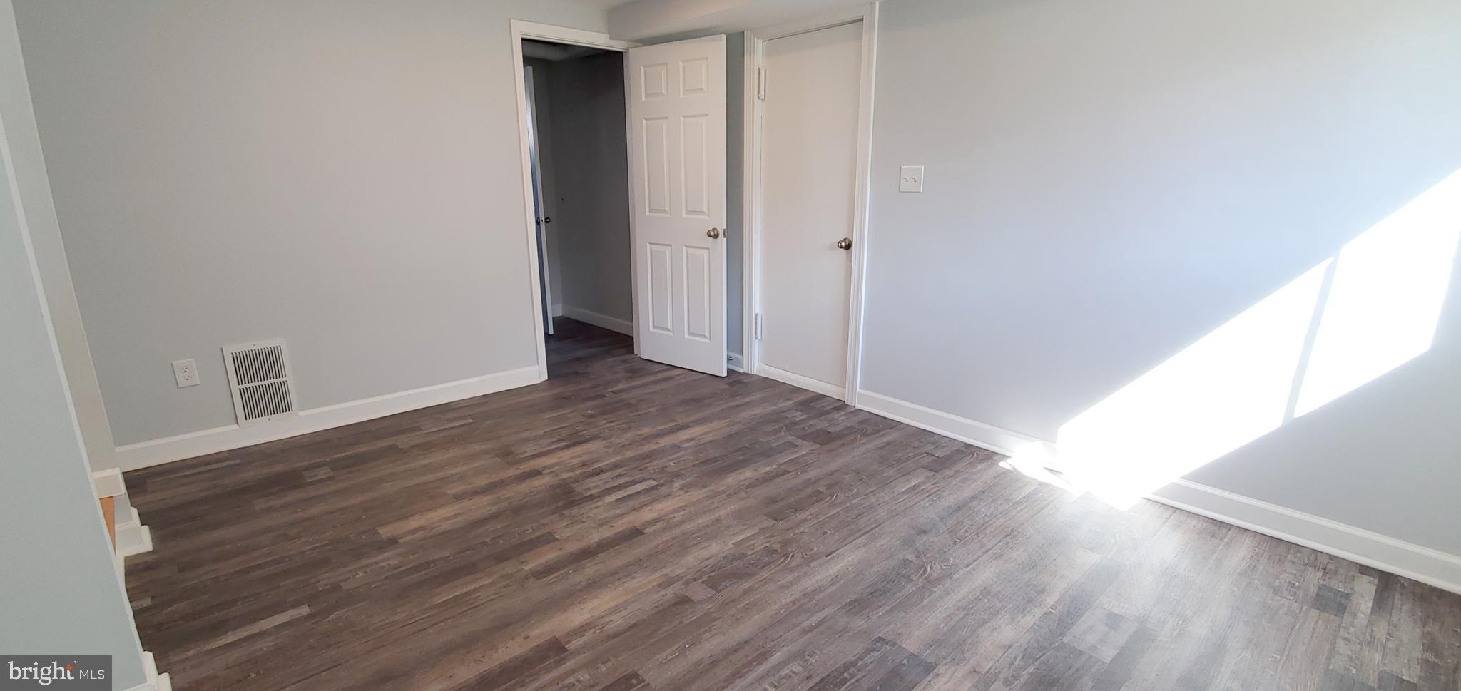 933 Bardswell Road Baltimore, MD 21228 - Photo 23 of 34 Spacious Family Room w/Garage Entry (Lower Level)