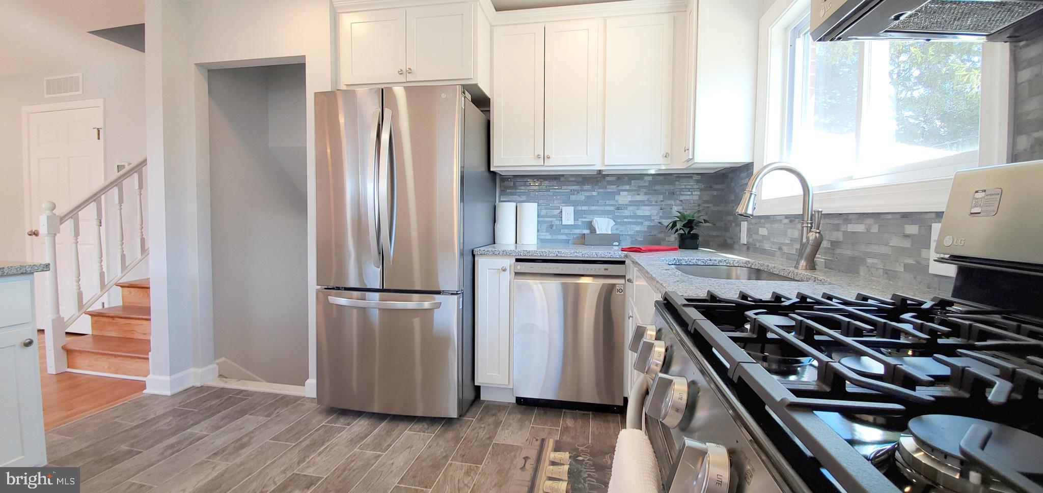 933 Bardswell Road Baltimore, MD 21228 - Photo 10 of 34 Gourmet Kitchen with Stainless LG Appliances