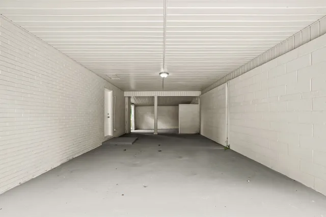 a view of a house with a big yard