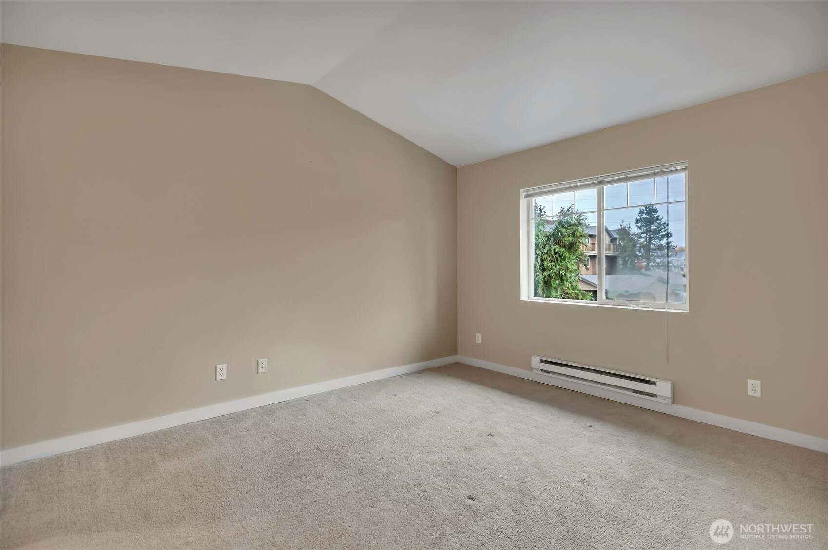 18930 Bothell Everett Highway, Unit B304 Bothell, WA 98012 - Photo 16 of 35 an empty room with windows