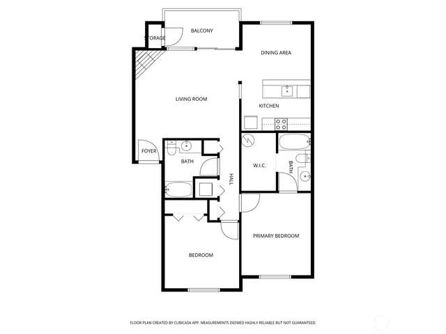 a view of a house with a garden and plants