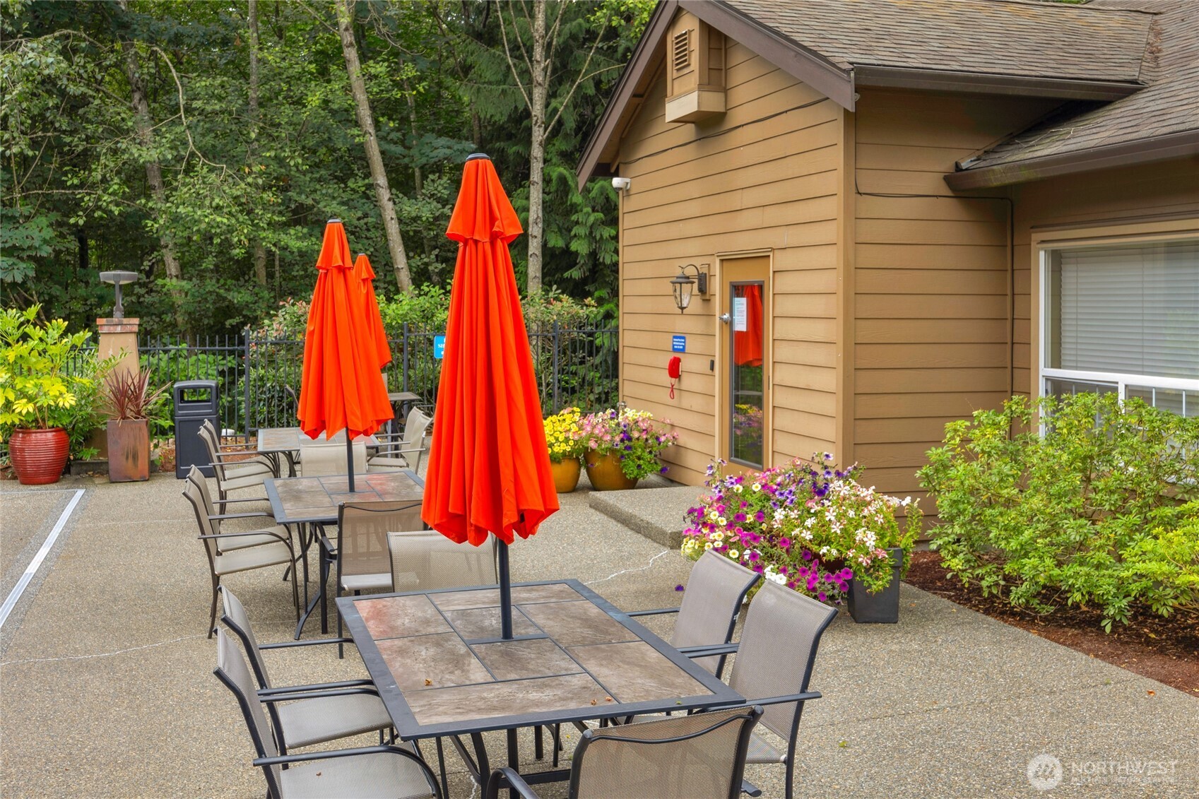 18930 Bothell Everett Highway, Unit B304 Bothell, WA 98012 - Photo 33 of 35 a view of patio with a table and chairs
