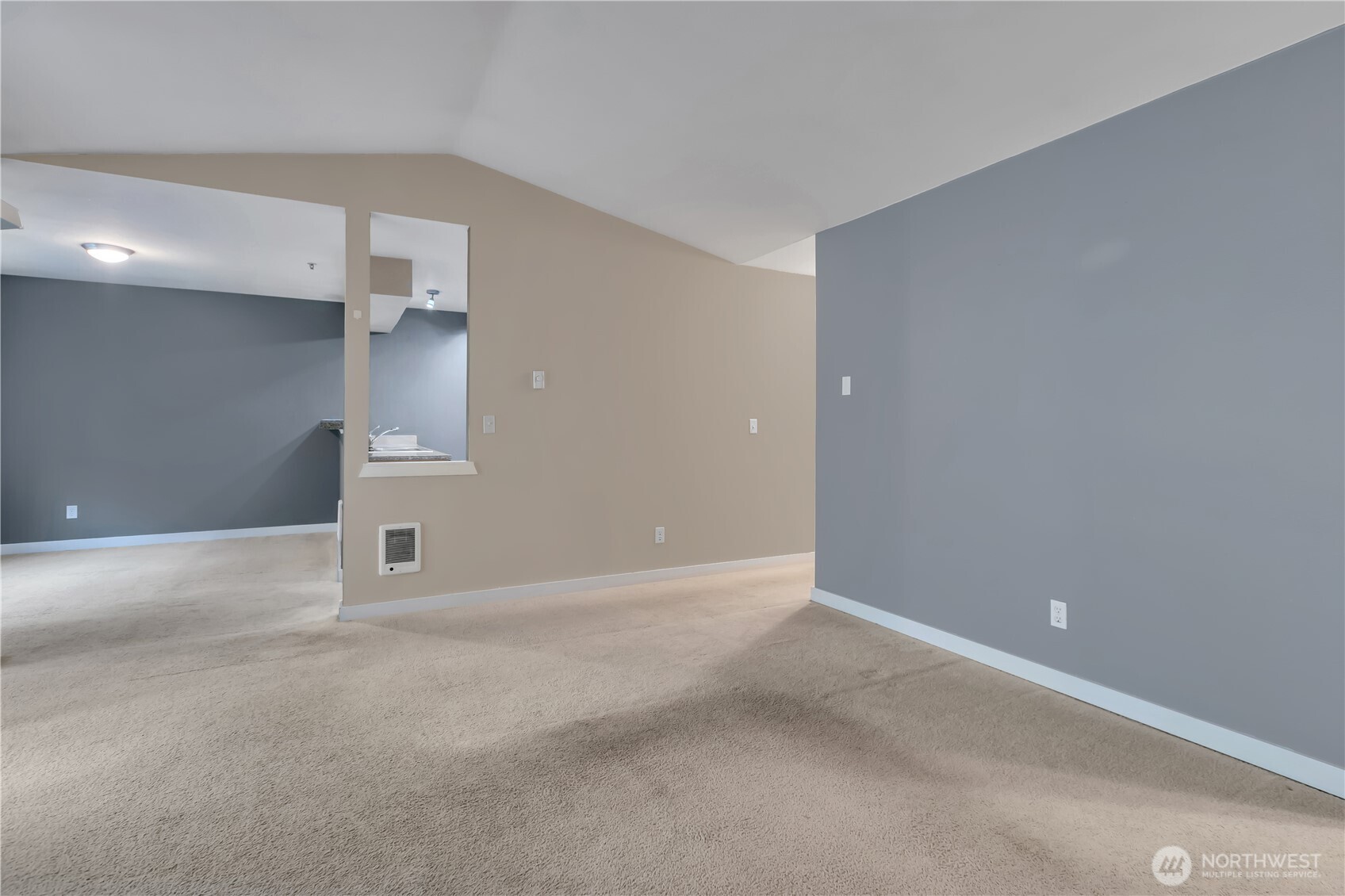 18930 Bothell Everett Highway, Unit B304 Bothell, WA 98012 - Photo 6 of 35 a view of an empty room with a window