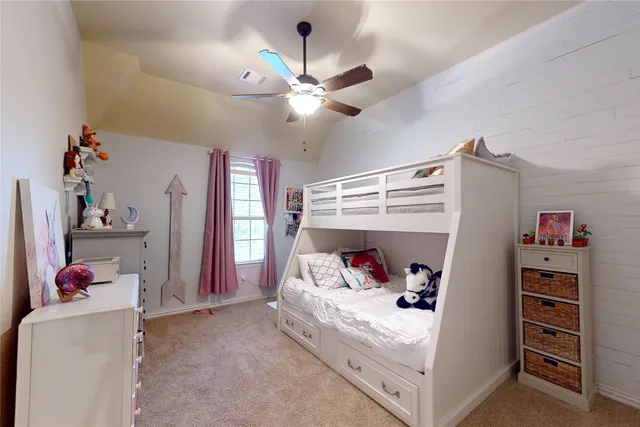 a bedroom with a bed and a walk in closet