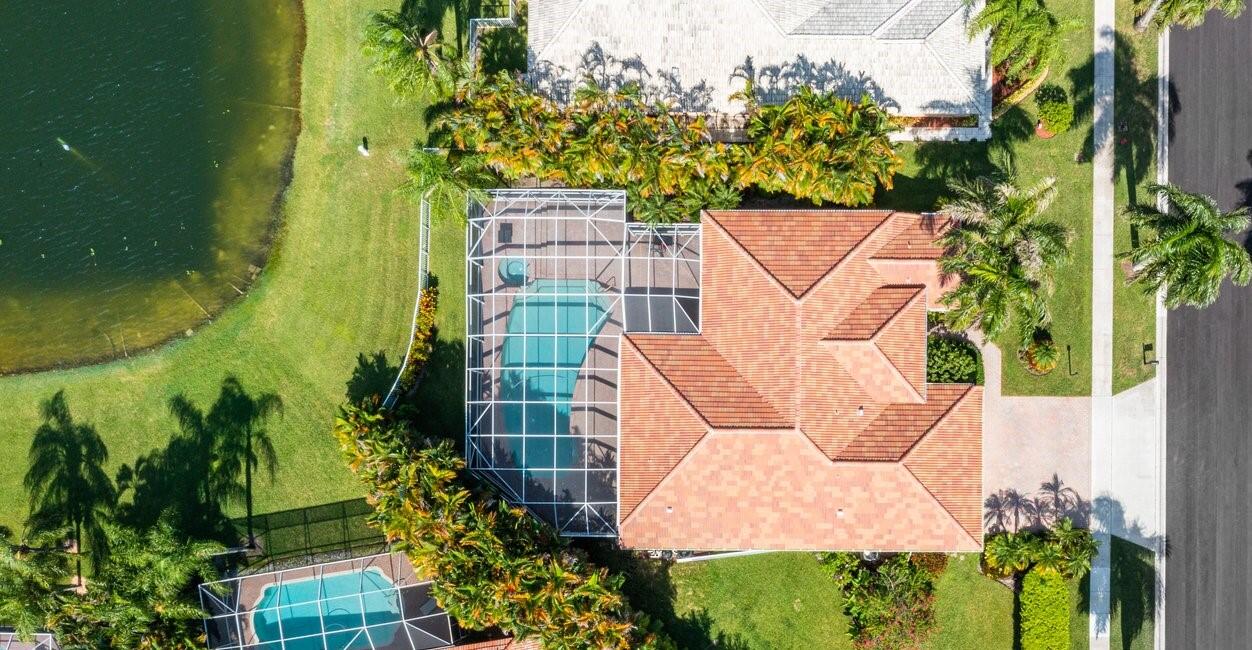 21432 Crestfalls Court Boca Raton, FL 33428 - Photo 26 of 31 an aerial view of a residential houses with yard