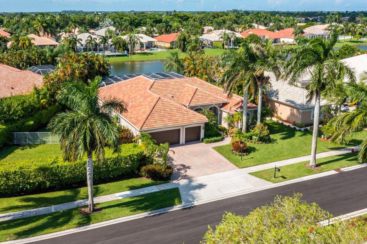 21432 Crestfalls Court Boca Raton, FL 33428 - Photo 27 of 31 an aerial view of a house with a yard and outdoor seating