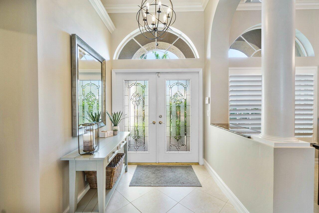 21432 Crestfalls Court Boca Raton, FL 33428 - Photo 3 of 31 a view of hall way with furniture and staircase