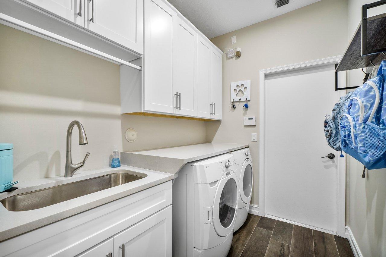 21432 Crestfalls Court Boca Raton, FL 33428 - Photo 10 of 31 a utility room with dryer and washer