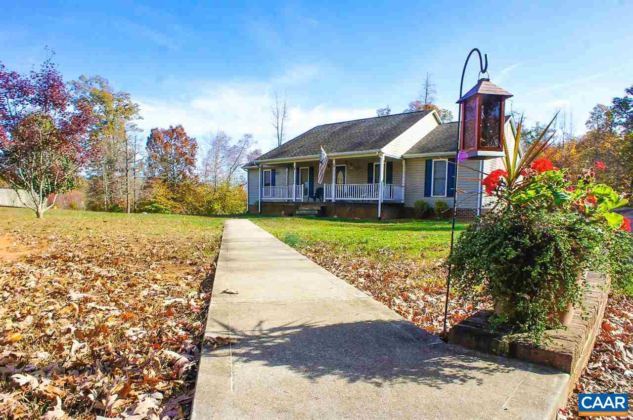 532 Watson Road Ruckersville, VA 22968 - Photo 1 of 21 a front view of a house with a yard and fountain