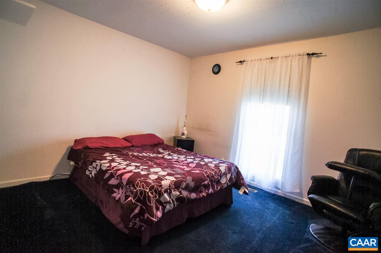 532 Watson Road Ruckersville, VA 22968 - Photo 12 of 21 a bedroom with a bed and a tv