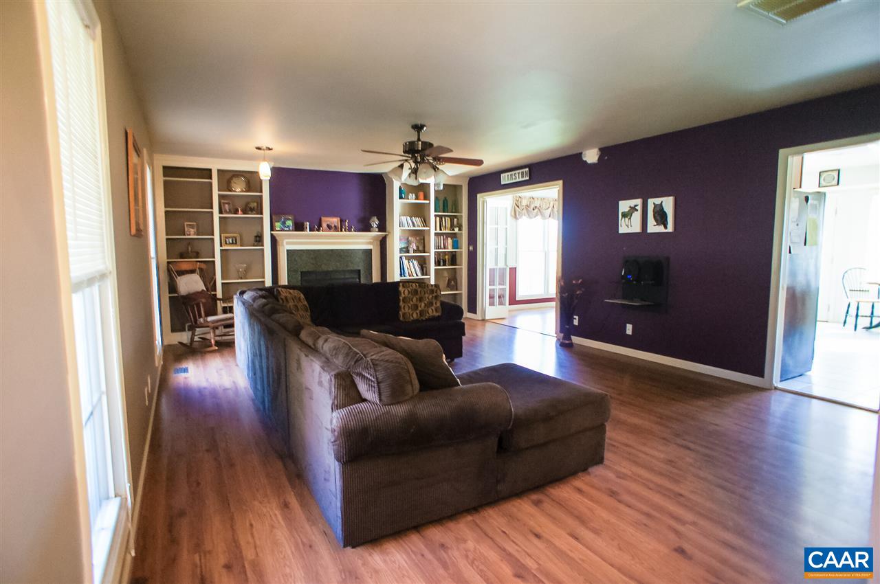 532 Watson Road Ruckersville, VA 22968 - Photo 4 of 21 a living room with furniture and a wooden floor