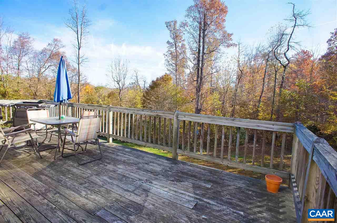 532 Watson Road Ruckersville, VA 22968 - Photo 10 of 21 a view of a chair and tables on the wooden floor