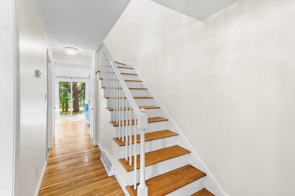 24 Jericho Road, Unit 24 Weston, MA 02493 - Photo 15 of 36 a view of entryway with wooden floor
