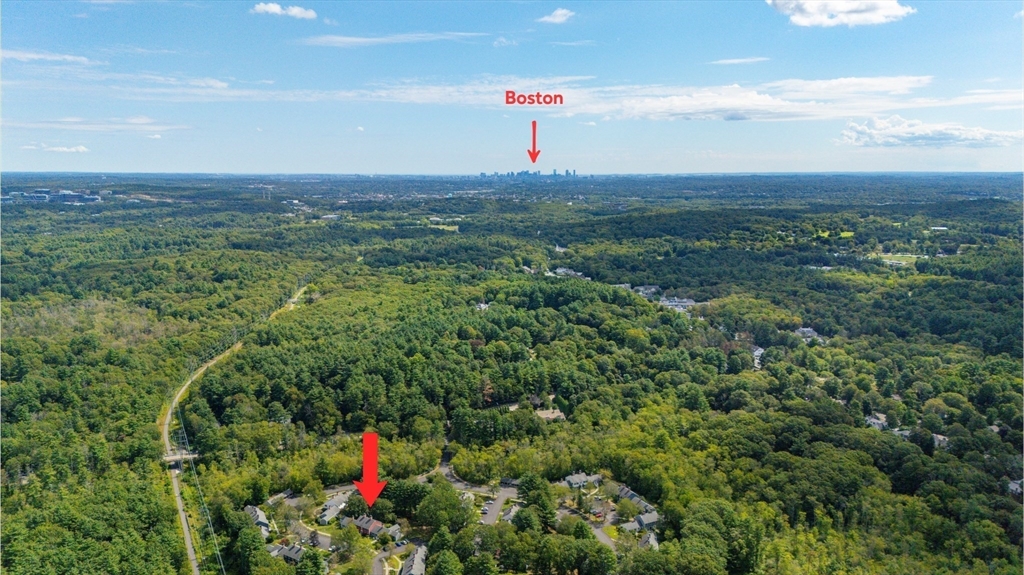 24 Jericho Road, Unit 24 Weston, MA 02493 - Photo 4 of 36 a view of a green field