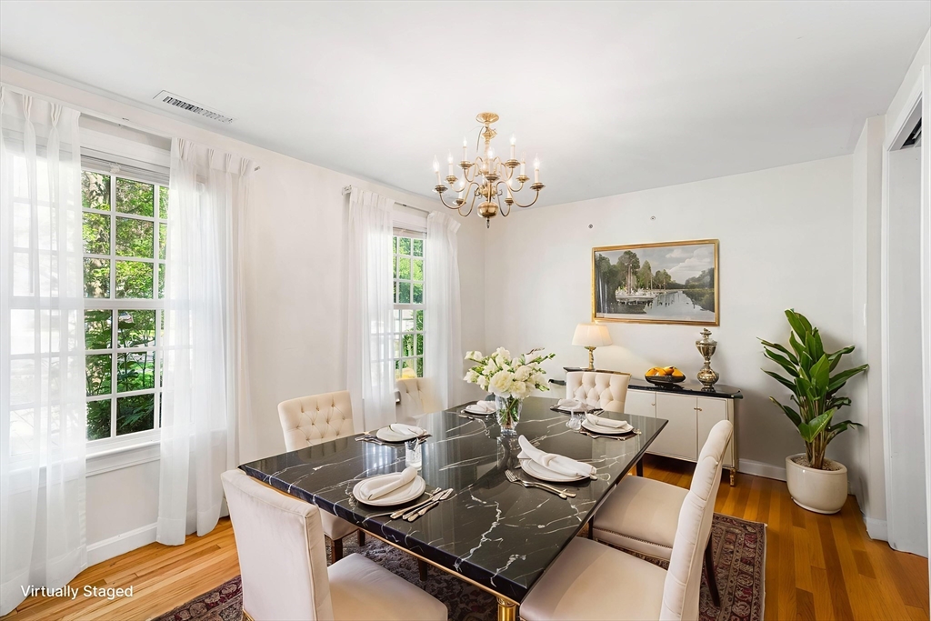 24 Jericho Road, Unit 24 Weston, MA 02493 - Photo 8 of 36 a living room with furniture and a potted plant