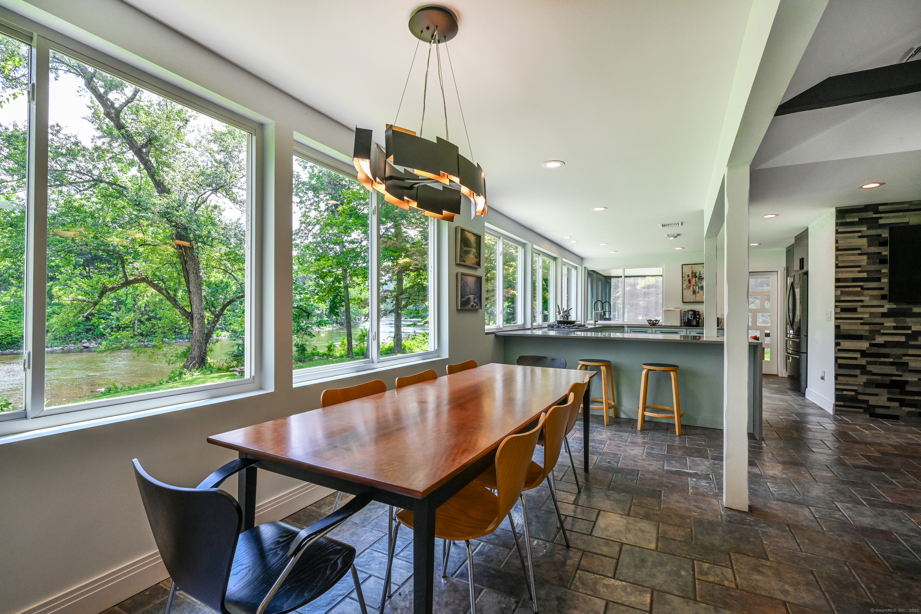 35 Kirk Road Sharon, CT 06796 - Photo 25 of 40 a dining room with furniture and wooden floor