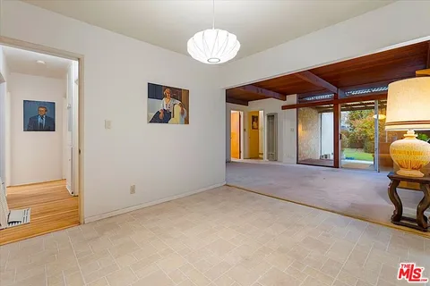 a view of an empty room and window