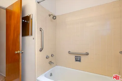 a view of a backyard with sitting area